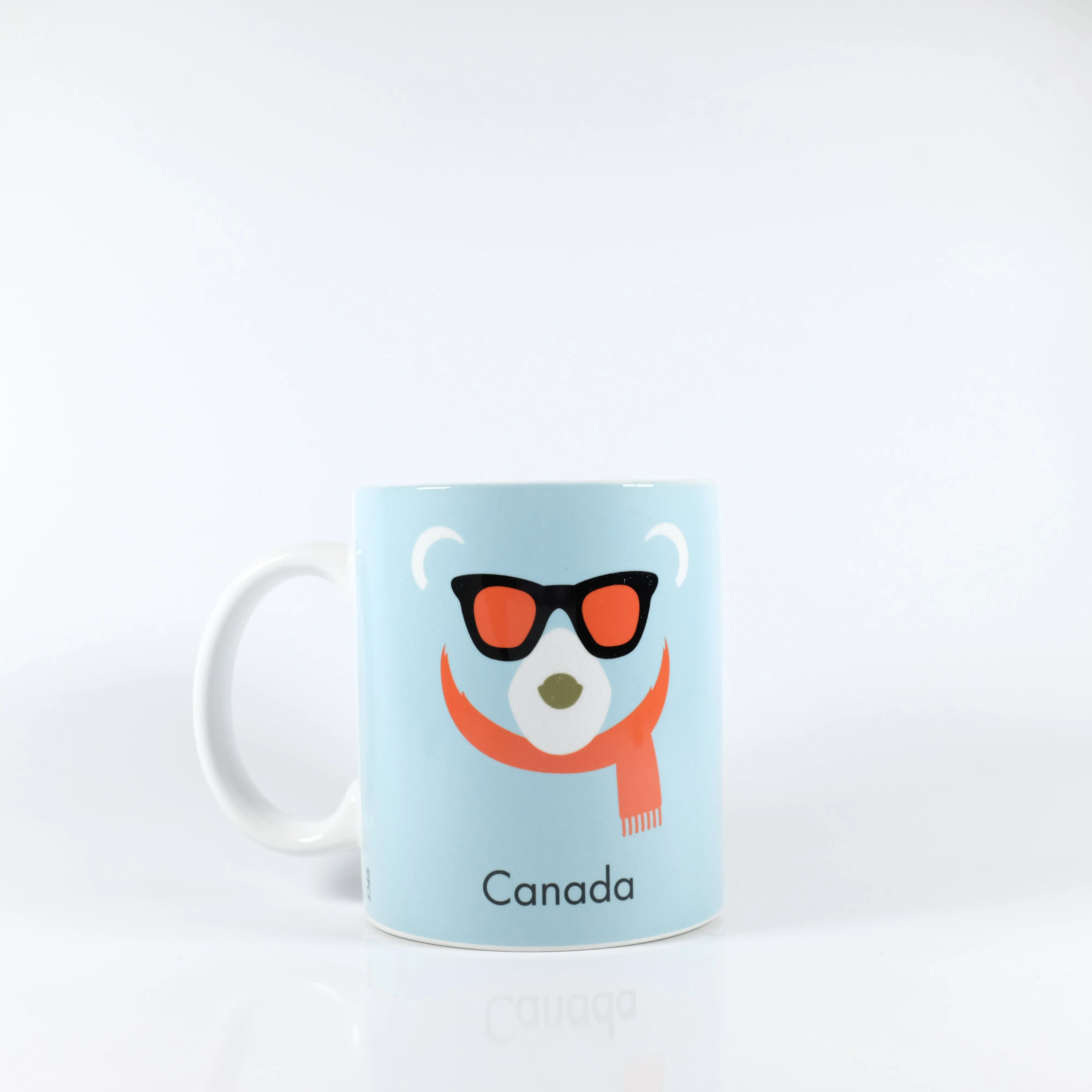 Cozy Canadian Polar Bear Mug with Stylish Scarf Design